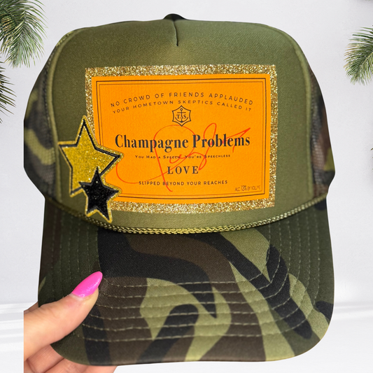 "Champagne Problems" Camo Glitter Trucker Hat : Dark Camo Hat - With Gold Star Patch